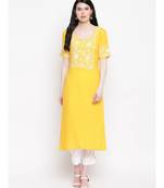 Yellow cotton rayon chikankari kurti with white cotton trousers