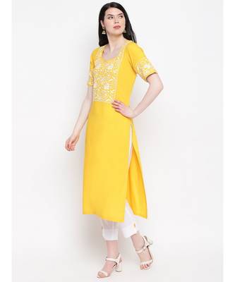 Yellow cotton rayon chikankari kurti with white cotton trousers 2