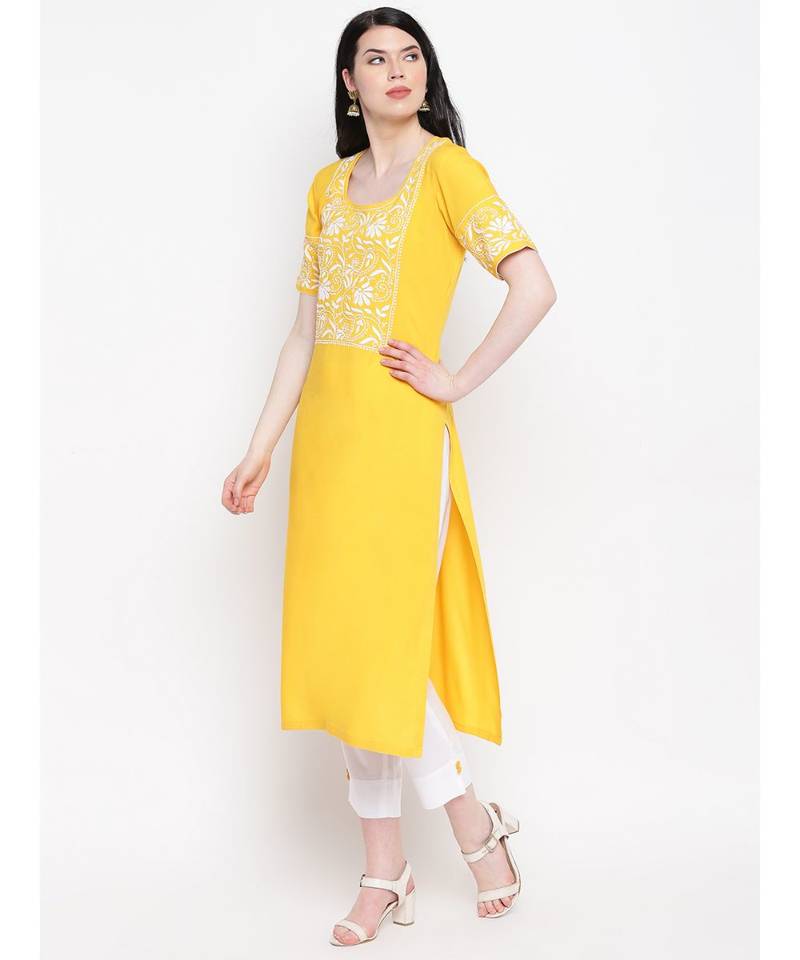 Yellow cotton rayon chikankari kurti with white cotton trousers