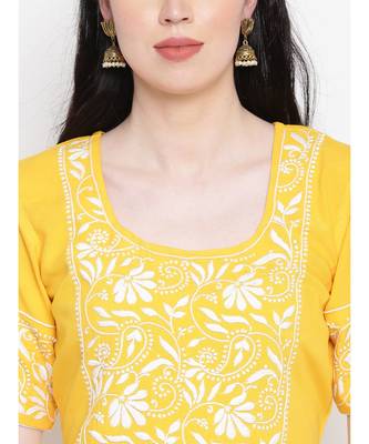 Yellow cotton rayon chikankari kurti with white cotton trousers 5