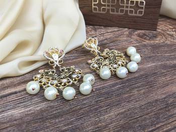 Gold earrings 1