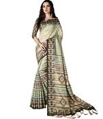 Cream printed art silk saree with blouse