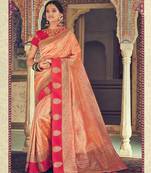 Peach woven silk saree with blouse