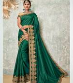 Dark green embroidered art silk saree with blouse