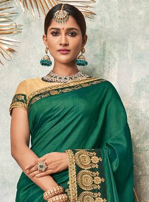 Dark green embroidered art silk saree with blouse 3