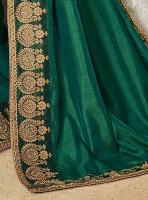 Dark green embroidered art silk saree with blouse 4