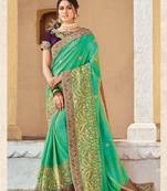 Green embroidered art silk saree with blouse