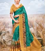 Turquoise printed pure georgette saree with blouse