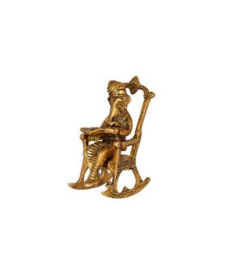 Lord Ganesha Statue Sitting on A Chair and Reading Ramayan 3