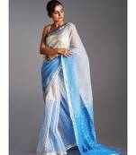 off white and blue blended cotton saree with golden strips