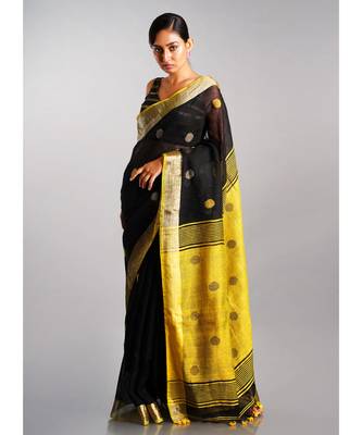 black linen saree with polka dots and yellow pallu 1