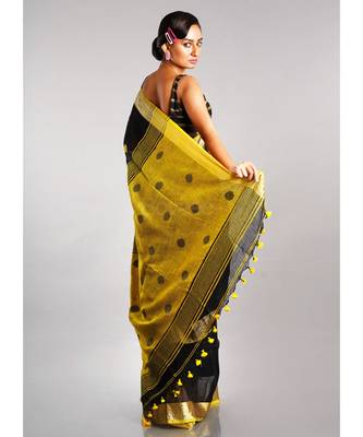 black linen saree with polka dots and yellow pallu 3