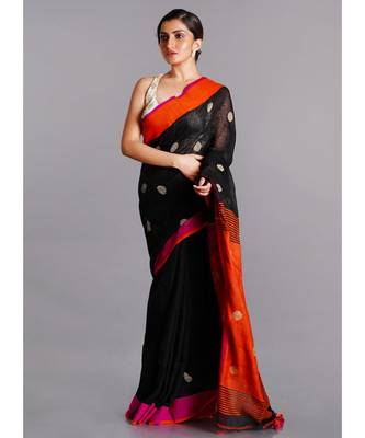 black linen saree with polka dots and orange pallu 1
