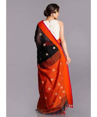 black linen saree with polka dots and orange pallu 3