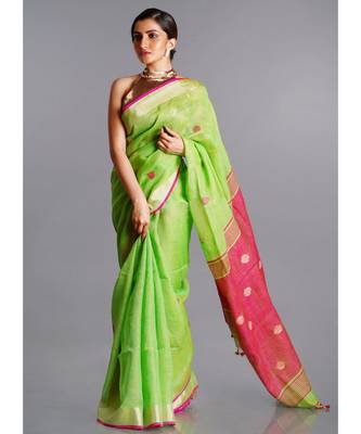 green linen saree with polka dots and pink pallu 2