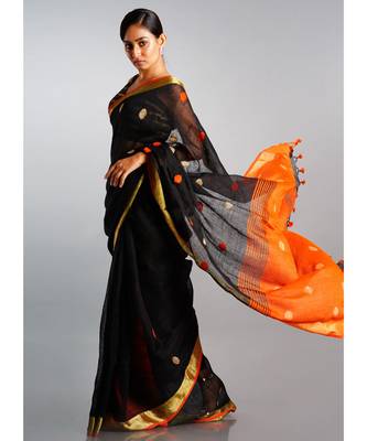 black linen saree with polka dots and orange pallu 2