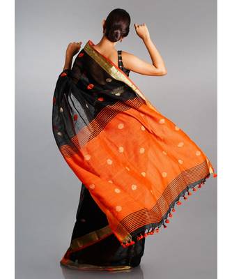 black linen saree with polka dots and orange pallu 3