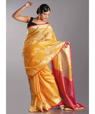 yellow tissue linen saree with pink pallu 1
