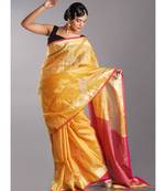 yellow tissue linen saree with pink pallu