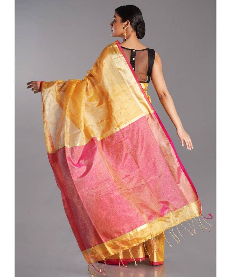 yellow tissue linen saree with pink pallu