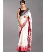 white linen sare with red and black temple border