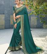 Green embroidered fancy fabric saree with blouse