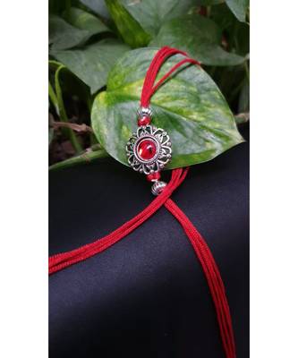 Multicolor jeweled rakhi 1