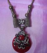 maroon stone and diamond necklace
