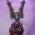 maroon stone and diamond necklace