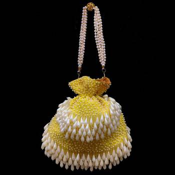 Worthyy Dropping Pearls Embellished Velvet Potli Yellow & White 1
