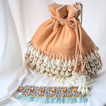 Worthyy Enterprises Velvet Dropping Pearl Potli (Peach) 1