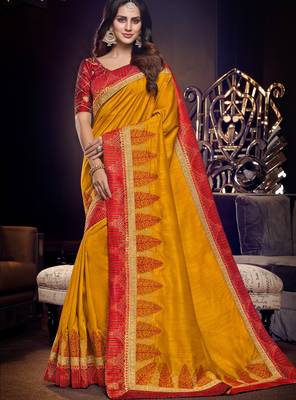 Yellow embroidered silk saree with blouse 1