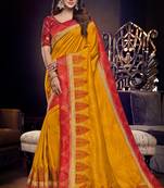 Yellow embroidered silk saree with blouse