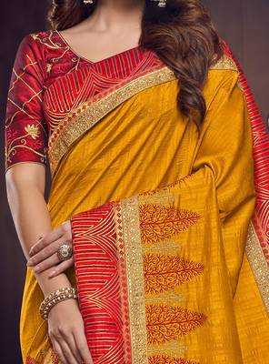 Yellow embroidered silk saree with blouse 3