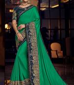 Green embroidered silk saree with blouse