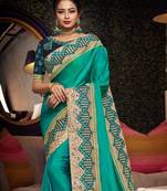 Green embroidered silk saree with blouse