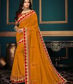 Orange embroidered silk saree with blouse