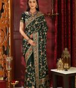 Dark green embroidered silk saree with blouse