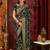 Dark green embroidered silk saree with blouse