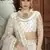 White zari embroidered net Semi Stitched bridal lehenga