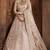 Beige embroidered net semi stitched lehenga