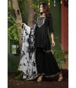 Black and white sharara suit set.