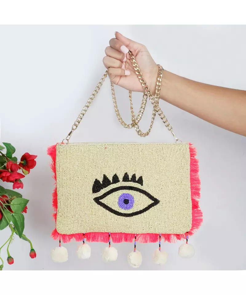 Creme Evil Eye Sling Bag