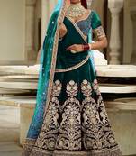 Green embroidered velvet semi stitched lehenga