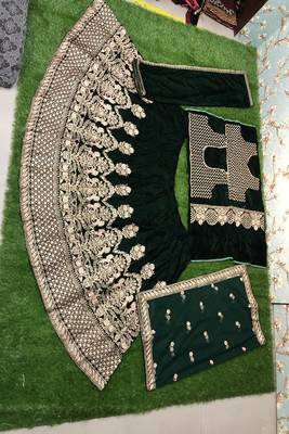 Green embroidered velvet semi stitched lehenga 2