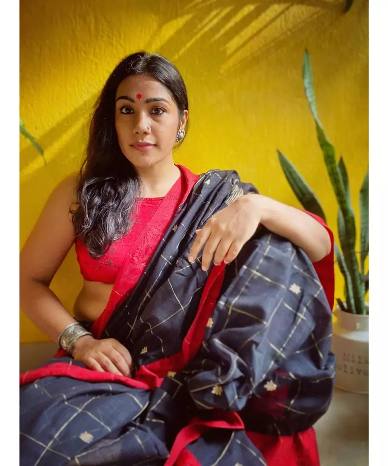 Khadi cotton in timeless black body & red border, with intricate meenakari flamingo motifs