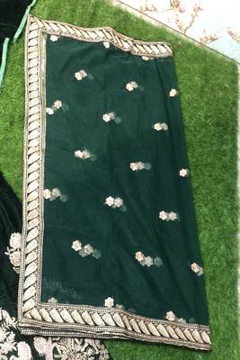 Green embroidered velvet semi stitched lehenga 4