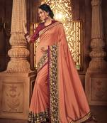 Peach embroidered silk saree with blouse