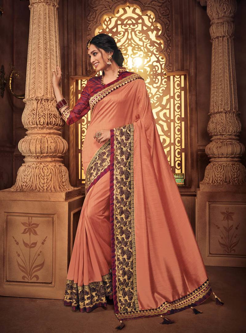 Peach embroidered silk saree with blouse