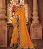 Orange embroidered silk saree with blouse